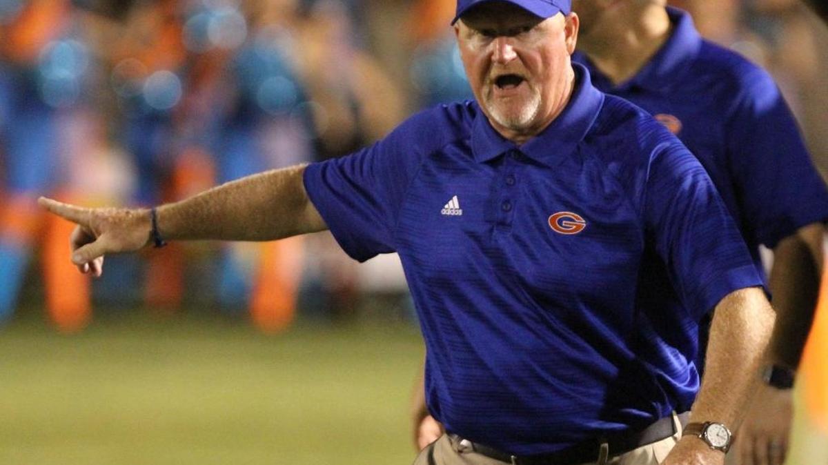 Gulfport head coach Eddie Pierce sends a player on the field during the first quarter of their Port City Bowl Classic game against George County at Milner Stadium on Gulfport on Friday, Aug. 18, 2017. The Admirals played at Petal on Friday.