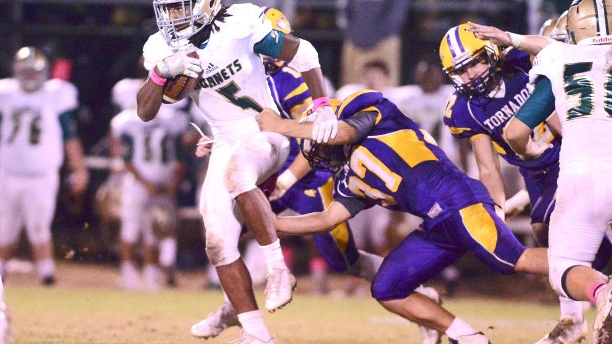 Austin Bolton rushes for Picayune in Purvis on Friday night.