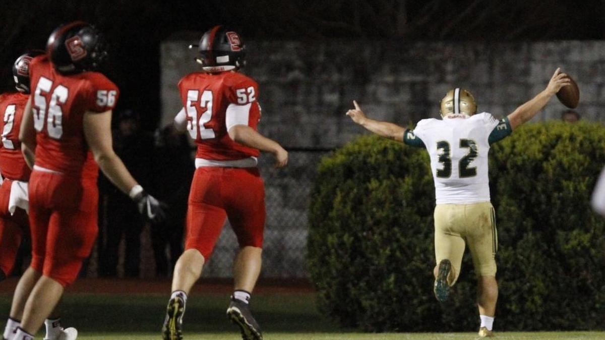 Poplarville linebacker Peyton Graham returns a St. Stanislaus fumble for a touchdown during the second quarter of their 4A playoff game at Brother Martin Stadium in Bay St. Louis on Friday, Nov. 10, 2017.