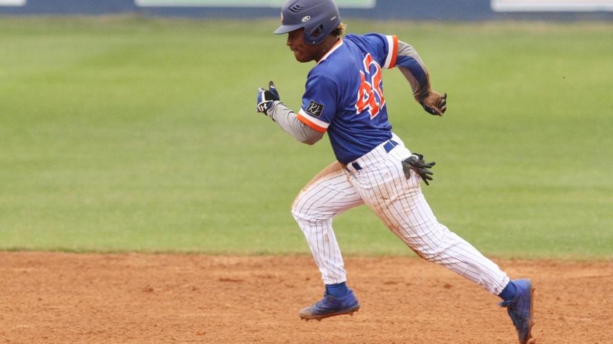 Gulfport's Dillon Brown runs to third on his way to scoring on a double by Castor Lee during the first inning of their Battle at the Beach tournament game against Southaven at Herbert Wilson Field in Gulfport on March 13.