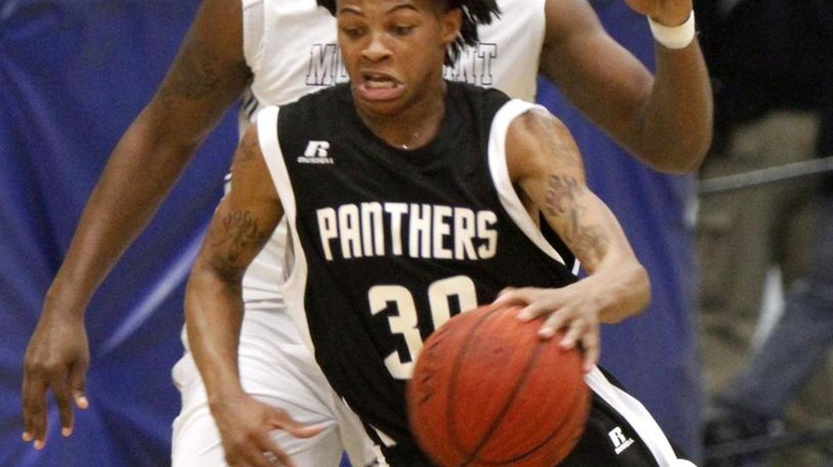 Pascagoula's Noel Jones pushes the ball up court against Moss Point, Dec. 4, 2015. The Panthers visit Bay High on Tuesday night in one of the bigger basketball matchups of the week.