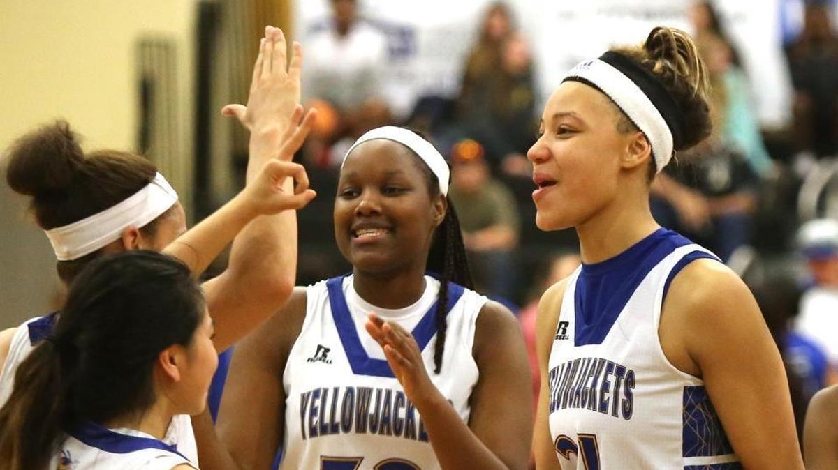 St. Martin's Daphane White, right, has committed to play basketball at Mississippi State.
