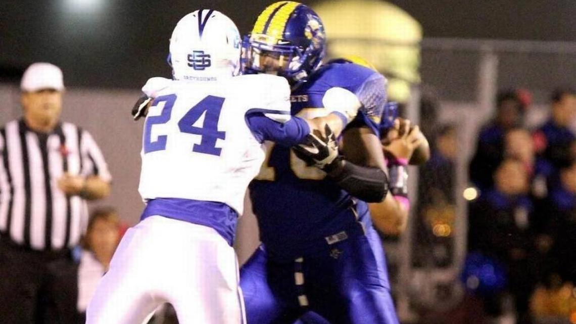 St. Martin lineman Brandon Cunningham (right) has verbally committed to Miami.