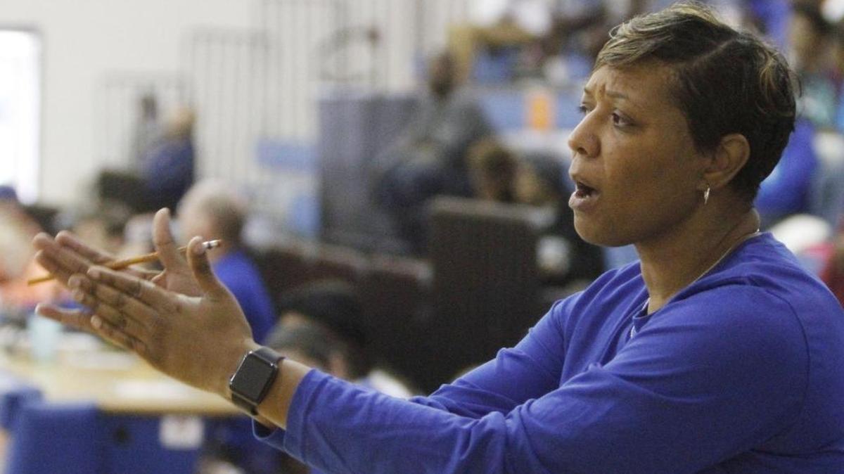 Ocean Springs' head coach LaShonda Smith disputes a call during the third quarter of their game against Warren Central in the Lady Admirals Thanksgiving Tournament at Bert Jenkins gym in Gulfport on Wednesday, Nov. 22, 2017.
