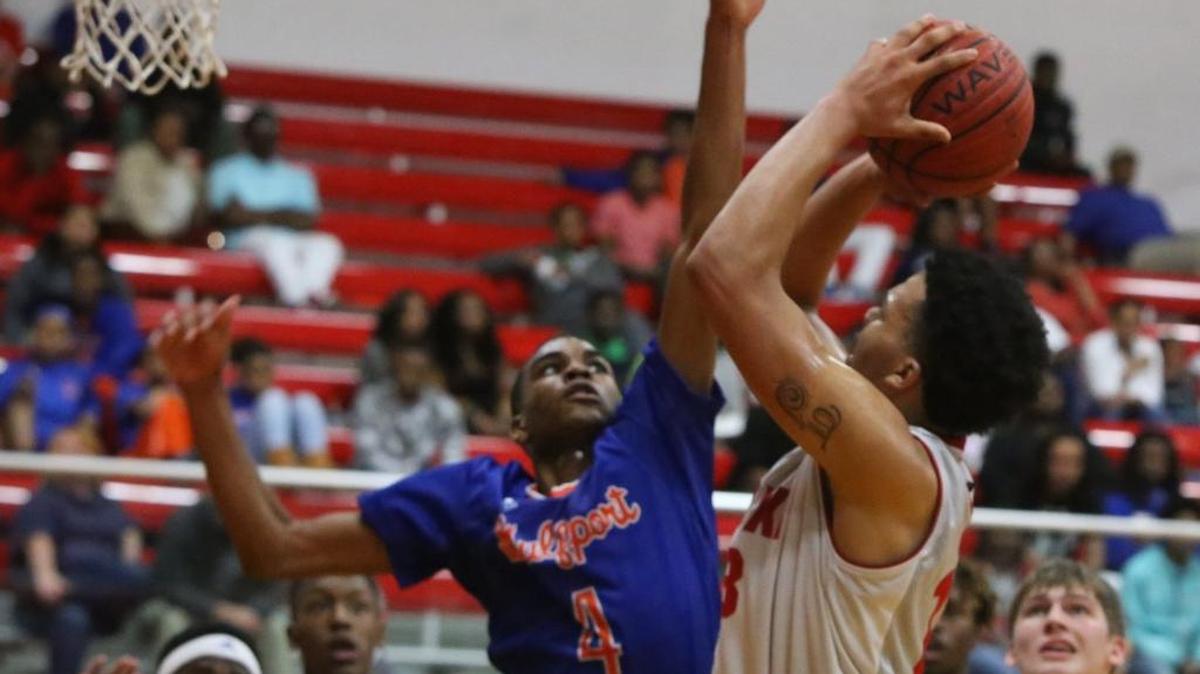 Biloxi's Fred Thompson puts up a shot against Gulfport's Keevon Oney during the second quarter of their game at Biloxi High School on Friday Feb. 10, 2017. Biloxi and Gulfport play again Tuesday in the first round of the Region 8-6A Tournament at BHS.