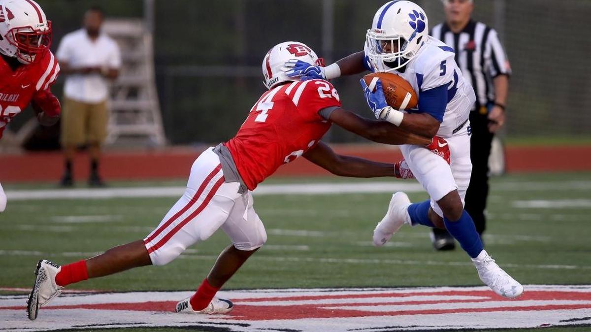 Biloxi's Dexter Johnson attempts to tackle Stone County's Kentrell McCray as he runs the ball on Friday, September 1, 2017, at Biloxi High.