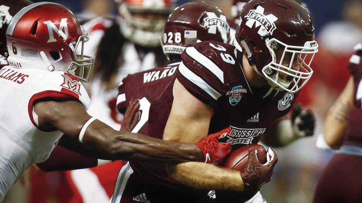 Mississippi State Bulldogs linebacker Richie Brown (39) runs the ball in the second quarter at Tropicana Field, Dec. 26, 2016 in St. Petersburg, Fla. Brown was recently signed to a reserve future contract with the Carolina Panthers.