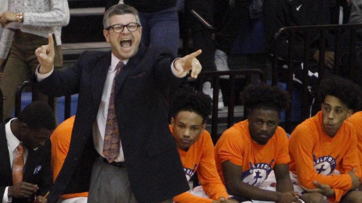Gulfport coach Owen Miller shouts instructions to his team during championship game at Gulfport Hardwood Holiday Classic on Dec. 30, 2016.