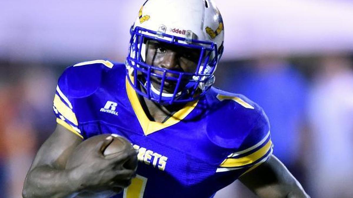 St. Martin running back Jovann"Ham" Mcgee (1) finished the season with almost 1,400 yards rushing for the Yellow Jackets.