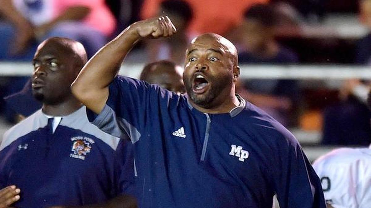 Moss Point head coach Eugene Harmon signals to the officials against East Central on Sept. 29 at East Central High School in Hurley.