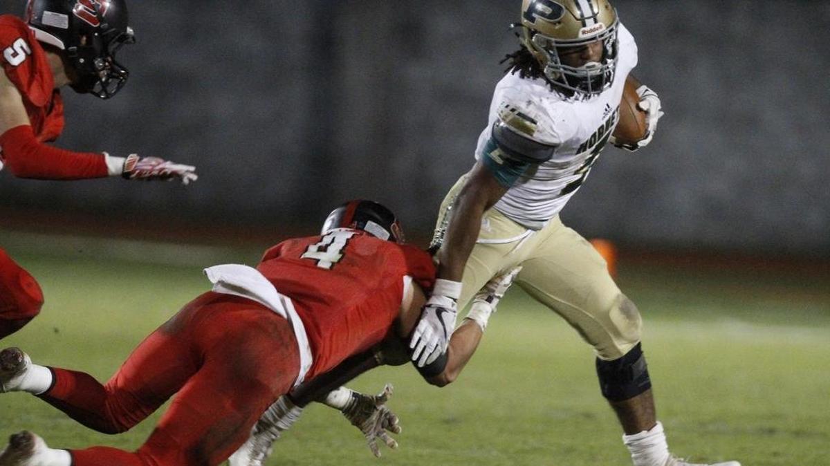 Poplarville running back Austin Bolton beats St. Stanislaus strong safety J.D. Rutherford during the second quarter of their 4A playoff game at Brother Martin Stadium in Bay St. Louis on Friday, Nov. 10, 2017.
