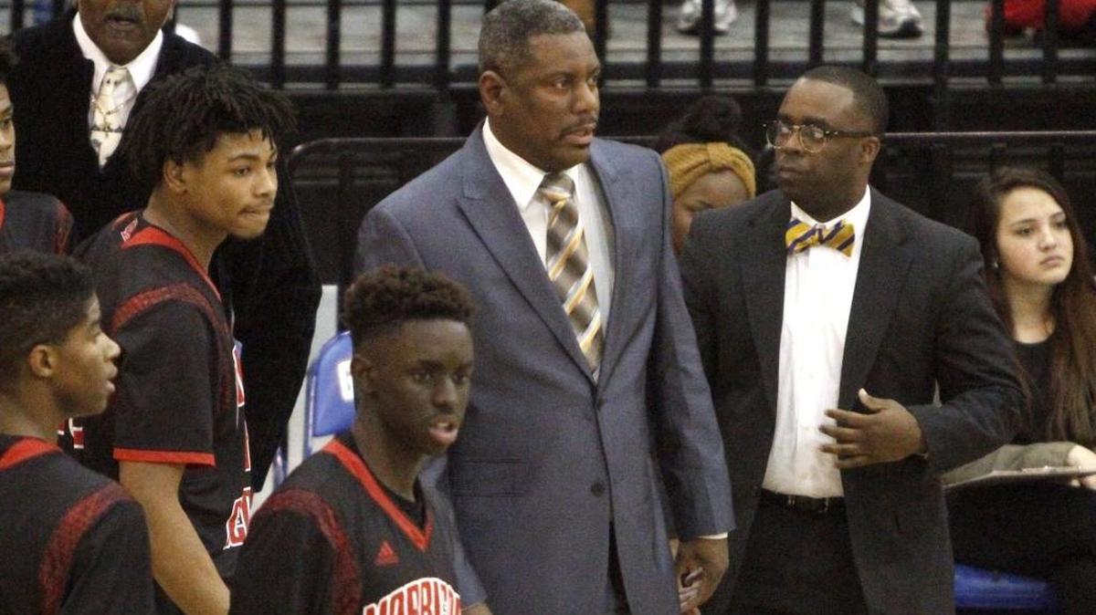 Harrison Central coach Boo Hardy led the Red Rebels past Quitman at the Chevron Classic on Saturday.