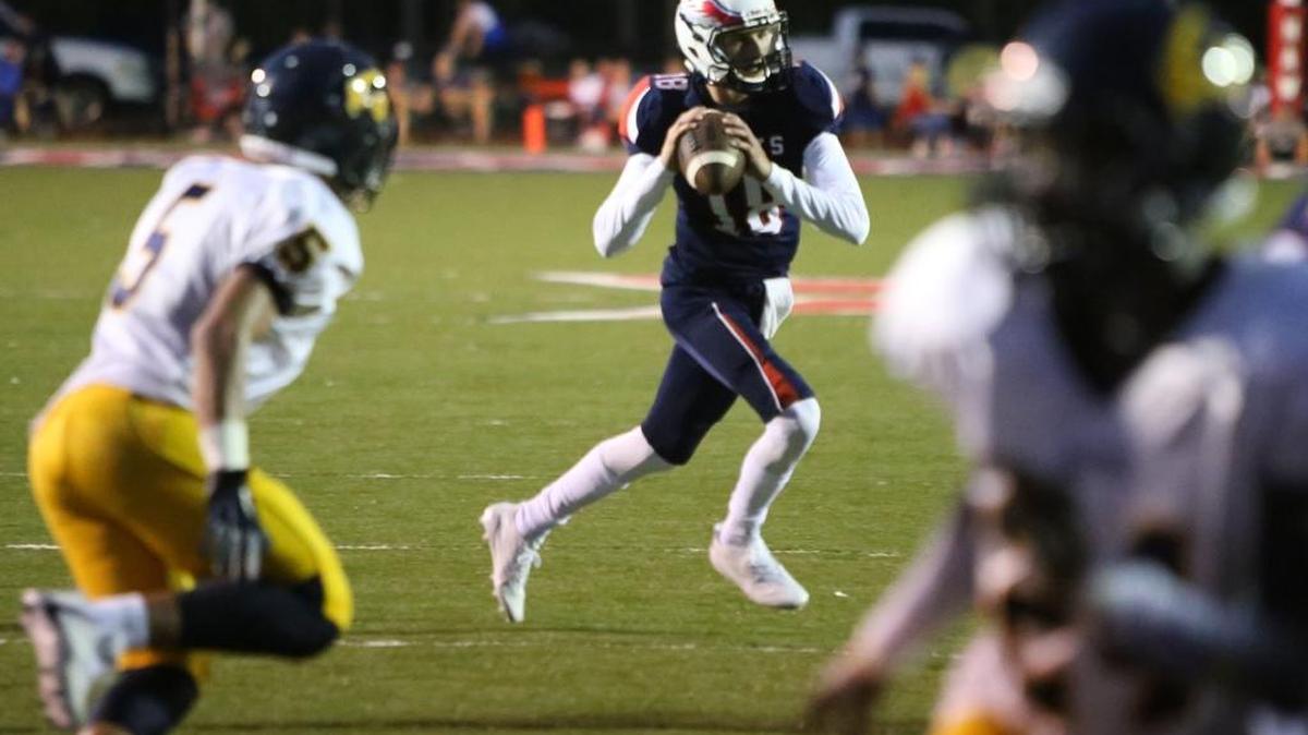 Hancock quarterback Caleb Garcia looks for a receiver during the second quarter of their game against Gautier Sept. 1, 2017. In Friday’s game against St. Martin, Garcia completed all 10 passes he attempted for 245 yards and four touchdowns.
