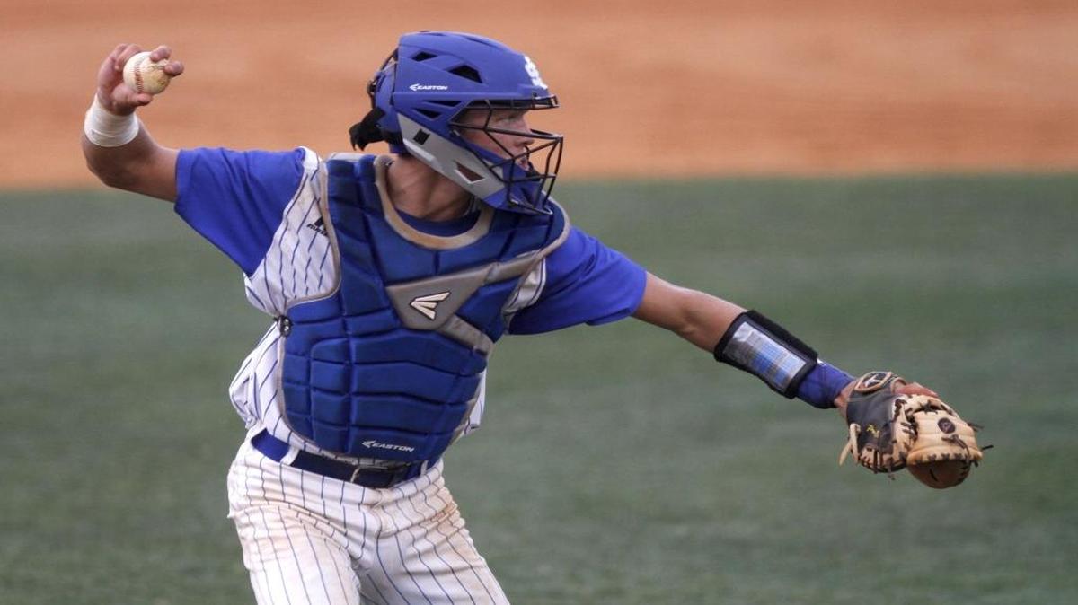 Ocean Springs catcher Britt McKay throws to first against Brandon. OSHS will face Gulfport in the third round of the MHSAA Class 6A playoffs.
