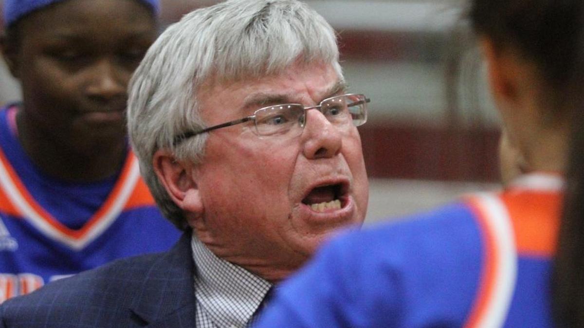 Gulfport head coach Donny Fuller talks to his players during a time out in the first quarter of their game against Biloxi at Biloxi High School on Feb. 10, 2017.