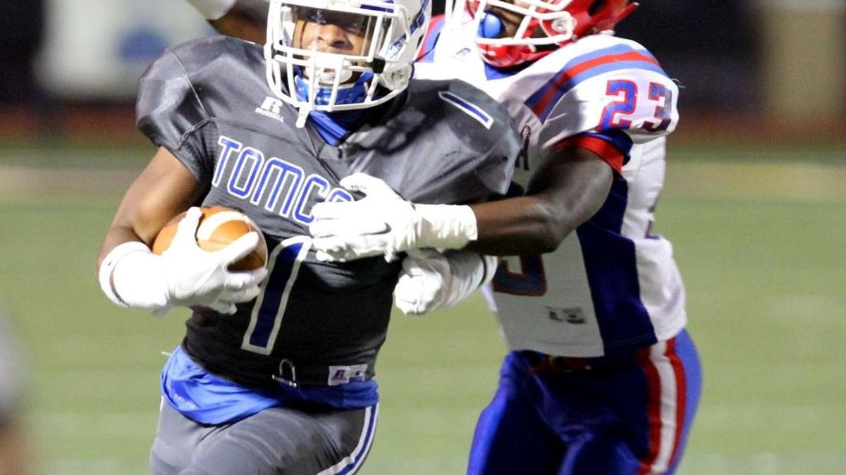Pascagoula's Adrian Johnson tackles Stone running back Terrion Avery during the first quarter of their game at A.L. May stadium in Perkinston on Sept. 30.