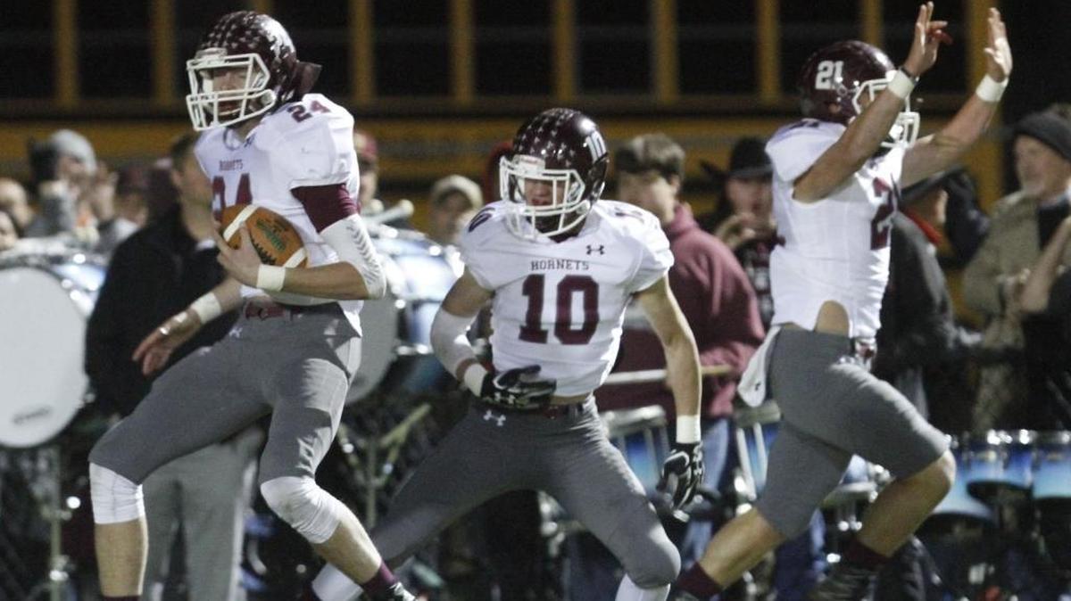 East Central players celebrate after linebacker Avery White, left, returned a fumble for a touchdown during the first quarter of their 4A South State championship game at Poplarville on Friday.