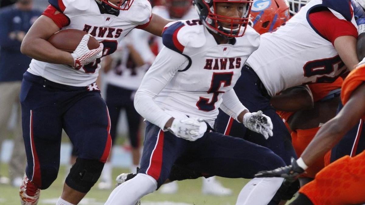Hancock running back Rondell Womack led the Hawks past D’Iberville Friday.