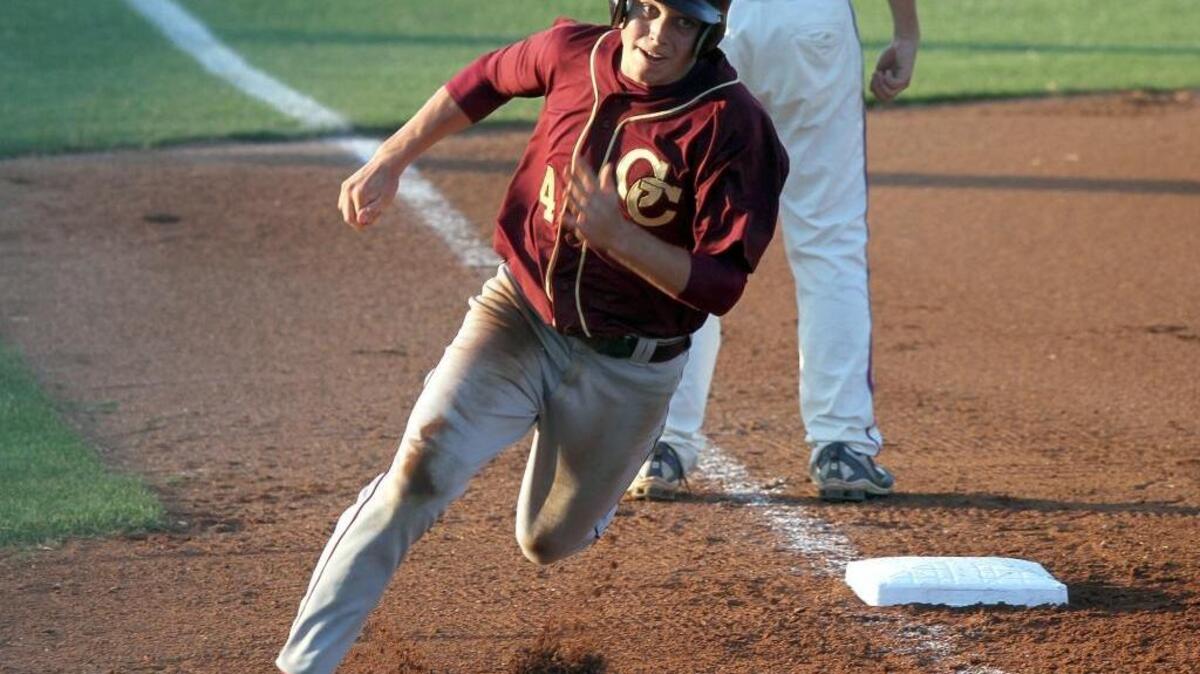 Jason McDonald of George County turns the corner at third on his way to scoring a run against Gulfport. McDonald recently accepted a coaching position at his alma mater, Nicholls State.