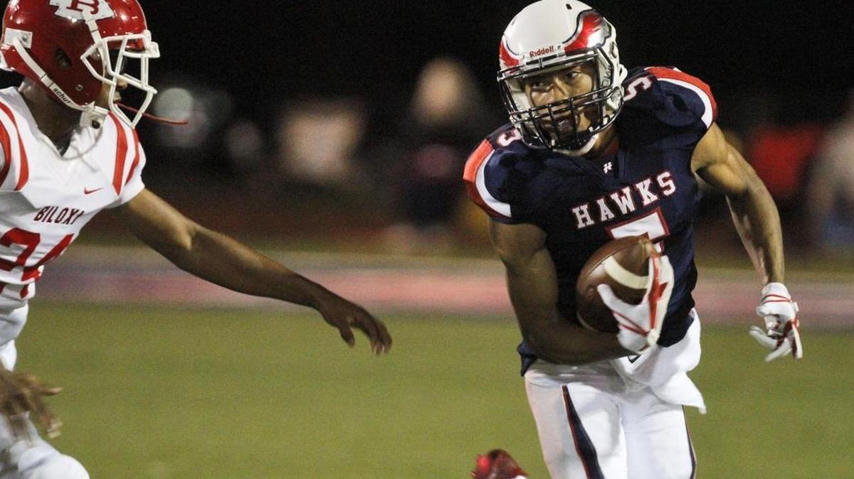 Biloxi safety Dexter Johnson chases Hancock running back Rondell Womack during the second quarter of their game at Brett Favre Field in Kiln on Friday, Oct. 27, 2017. Hancock will visit Pearl on Friday in the second round of the MHSAA Class 6A playoffs.