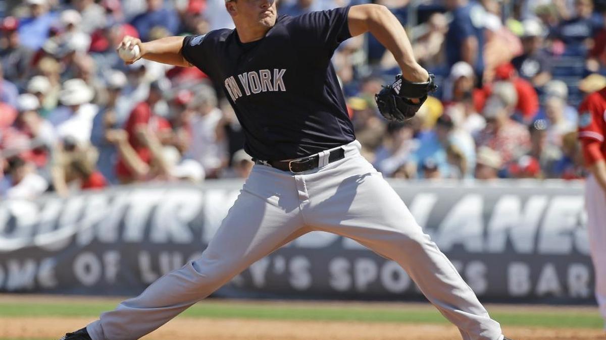 New York Yankees’ Jonathan Holder pitches against the Philadelphia Phillies in a spring training game March 22 in Clearwater, Fla. The former Gulfport Admiral will break camp with the Yankees, the club announced Thursday.