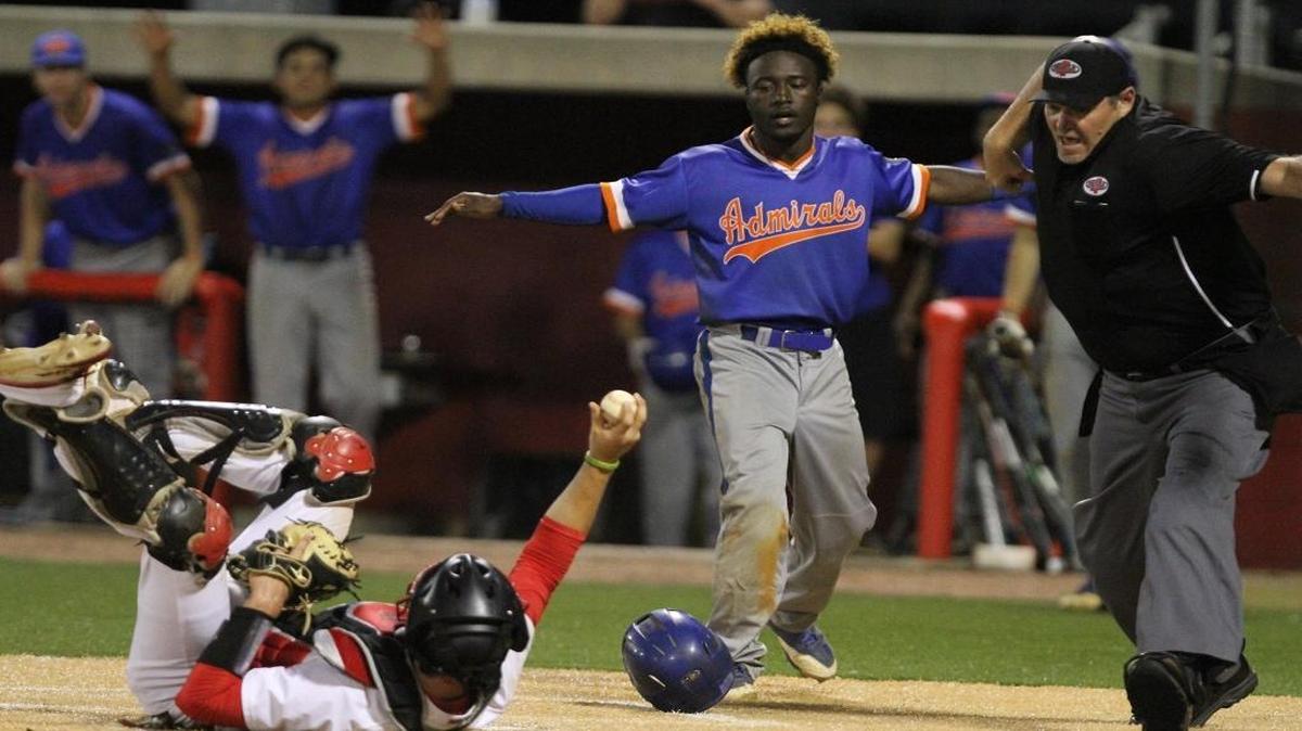 Gulfport's Larazzo Shugart watches as the umpire calls him out following a tag by Biloxi catcher Tucker Thomas during the third inning of their game at Biloxi on Tuesday, March 28, 2017. GHS heads into this week’s two-game series with rival Harrison Central boasting a 19-1 record.