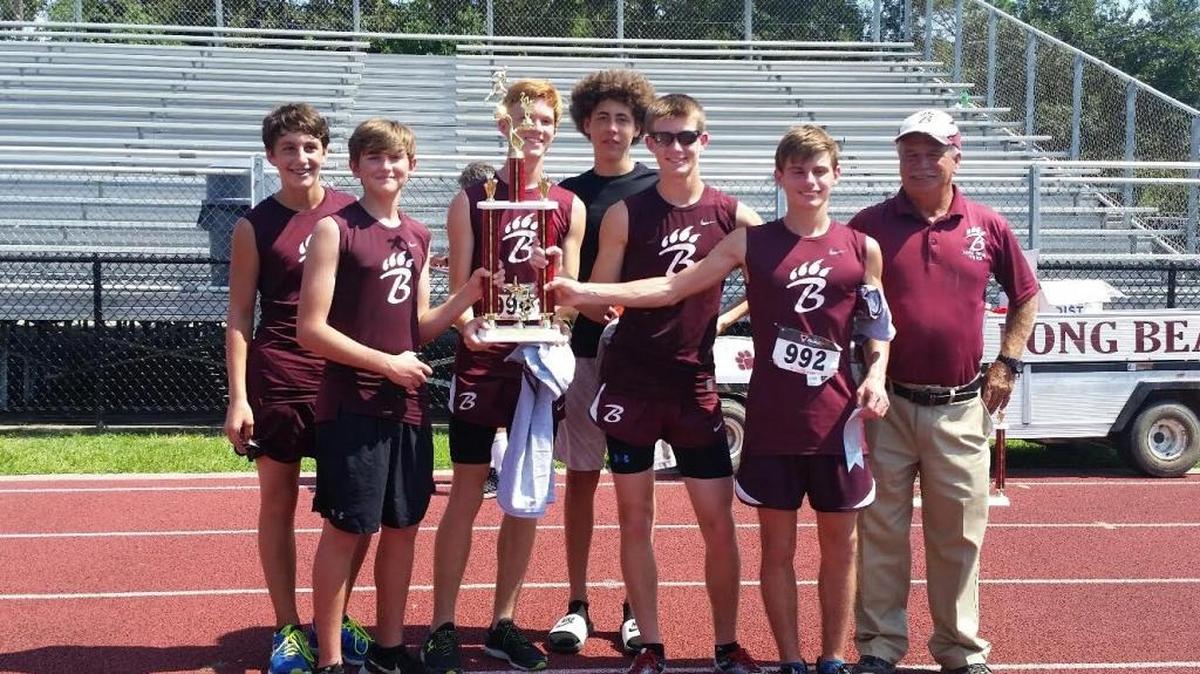 Long Beach won the Bearcats’ Cross Country Classic. Team members from left to right: Long Beach boys team members Garret Touchet, Devin Carter, Michael Filibeck, Elijah Paige, Chase Burkley, James Dickerson and Coach Olan Welch.