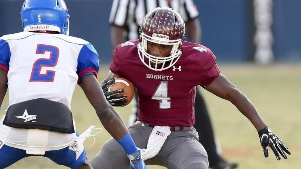 East Central’s Tony Brown (4) looks to get by Noxubee County's Keymarcus Jackson (2) on Dec. 2 at Vaught-Hemingway Stadium on the in Oxford.