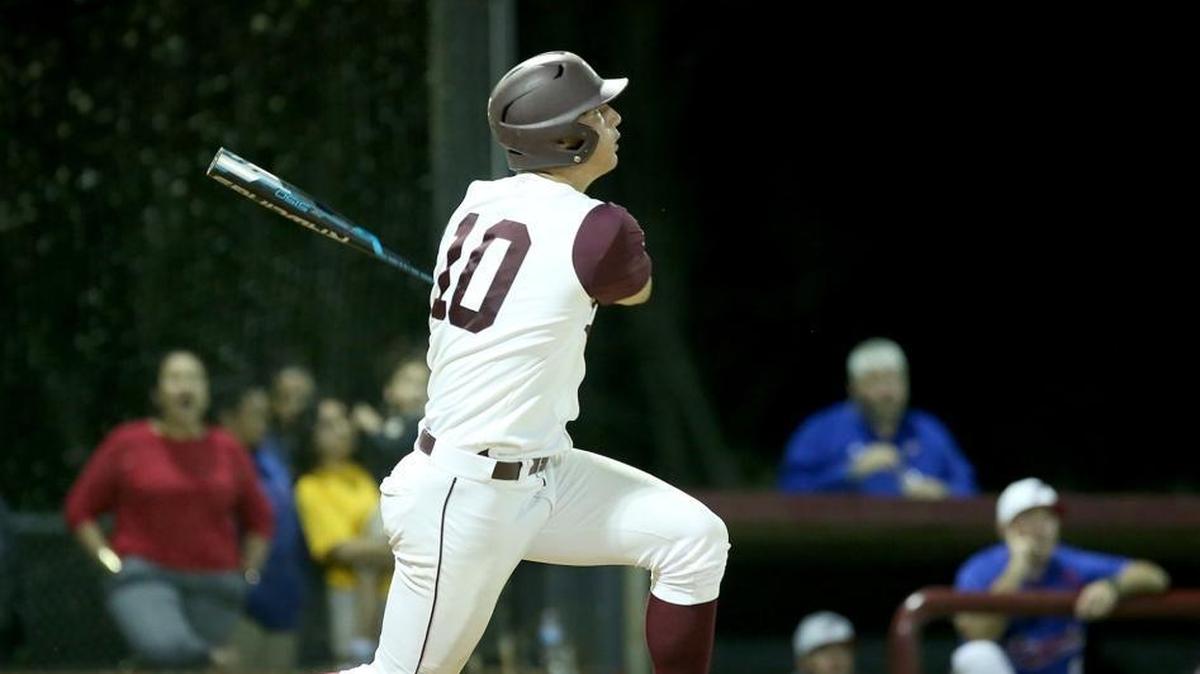 East Central's Brad Cumbest watches as his hit sails over the fence for a home run against Pascagoula on March 1 in Hurley.