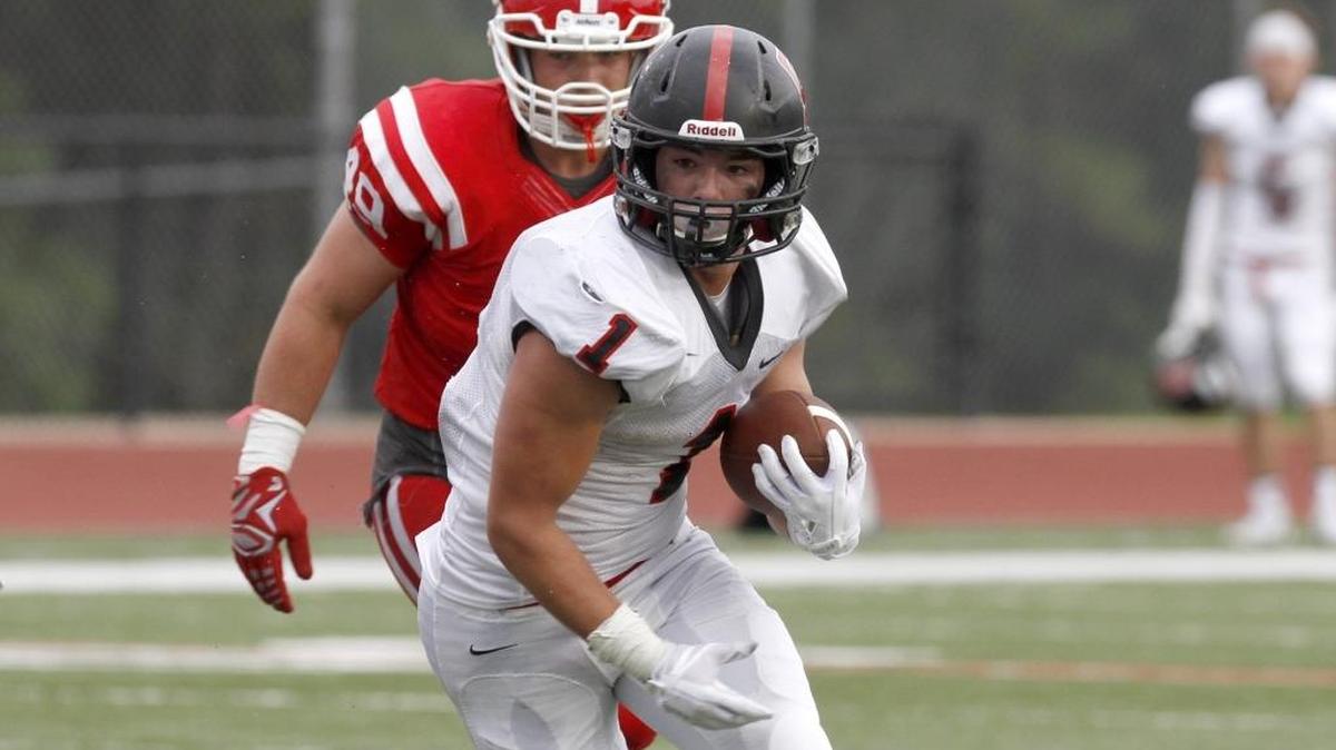 St. Stanislaus running back Andrew Trapani rumbles for a first down against Biloxi at the Shrimp Bowl Saturday afternoon, Aug. 19, 2017. SSC hosted Bay on Friday.