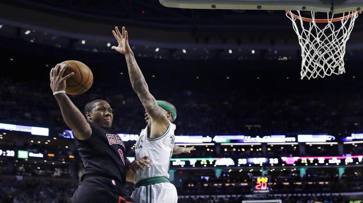 Chicago Bulls guard Isaiah Canaan, left, drives to the basket against Boston Celtics guard Isaiah Thomas (4) during the second quarter of a first-round NBA playoff basketball game in Boston, Wednesday, April 26, 2017. Canaan signed with the Oklahoma City Thunder on Sunday.