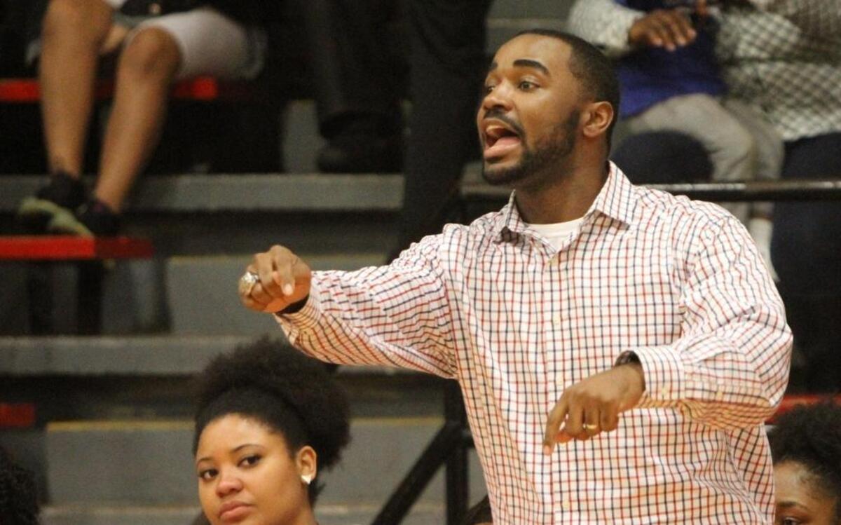Biloxi head coach Devin Hill yells instructions to his team during the first quarter of their game at Harrison Central on Feb. 2.