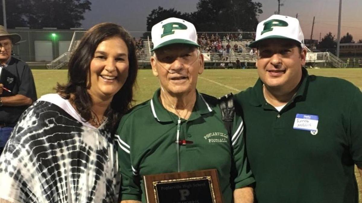 Former Poplarville coach Pat Morris, middle, pictured with his kids Leigh Greer and Randy Morris. Pat Morris died Nov. 27 at age 77. He's Poplarville's winningest football coach in program history.