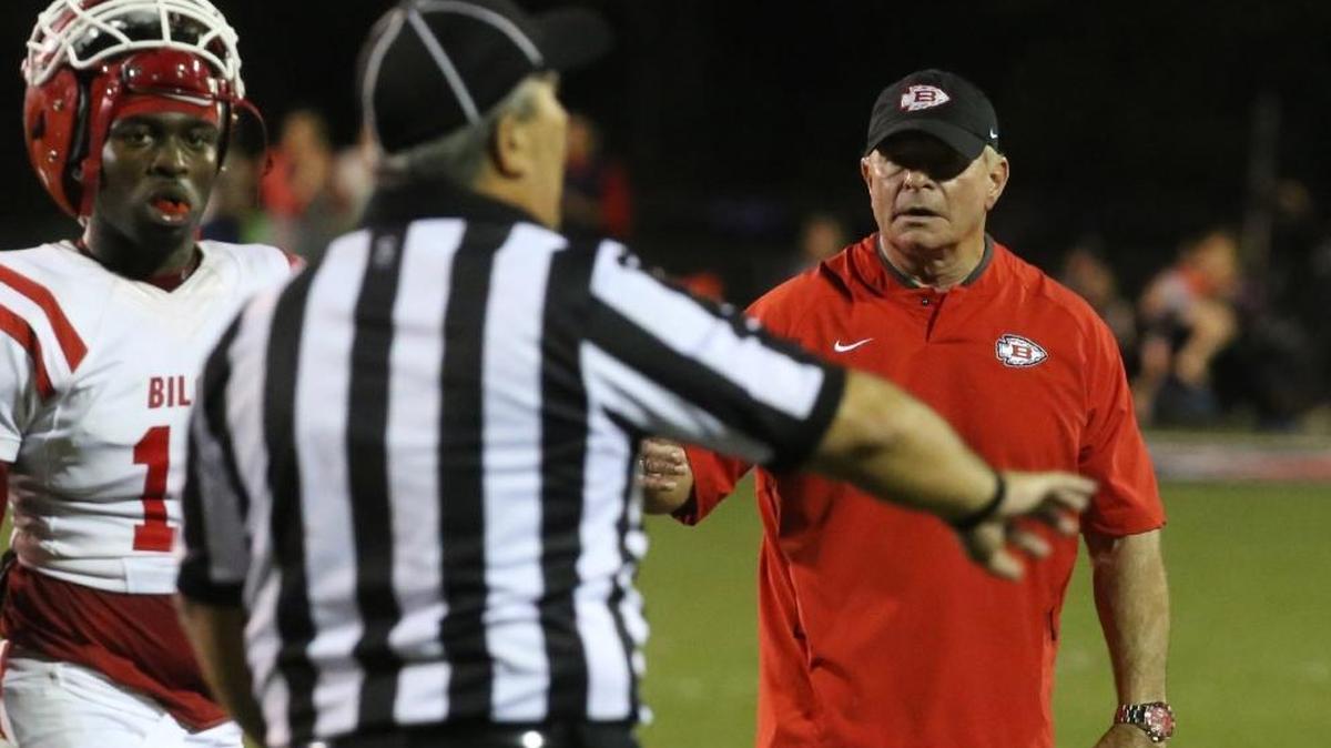 Biloxi head coach Bobby Hall talks to a referee during the fourth quarter of their game against Hancock at Brett Favre Field in Kiln on Oct. 27, 2017.