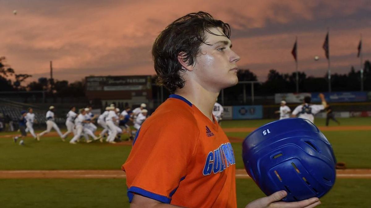 Gulfport's Jacob Roberts walks away as Tupelo begins to celebrate on Saturday, May 20, 2017, in the MHSAA State Baseball Championships at Trustmark Park in Pearl, Miss.