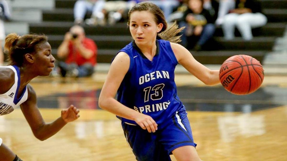 Ocean Springs' Sophie St. Amant dribbles the ball past St. Martin's Mercedes Brown on Friday, Feb. 19, 2016, at D'Iberville High. St. Amant scored 12 points Tuesday night for OSHS against Laurel in the Lady Admiral Thanksgiving Classic.