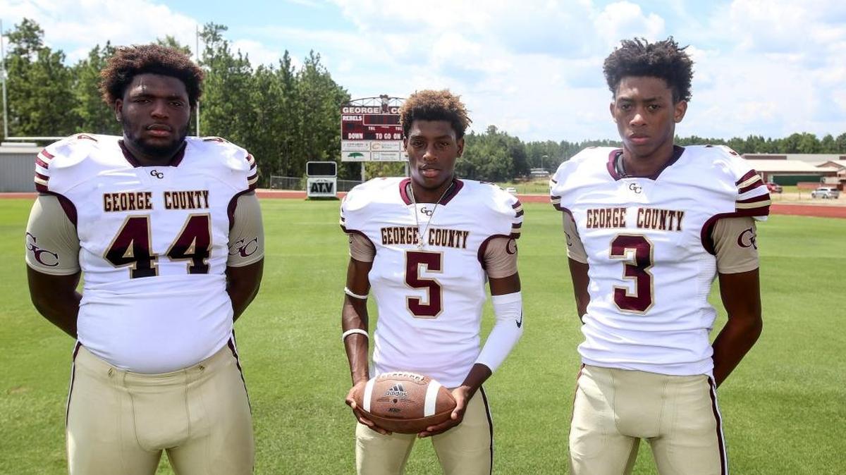 George County's McKinnley Jackson, left, Jamar Jackson, center, and Jonovan Jackson.