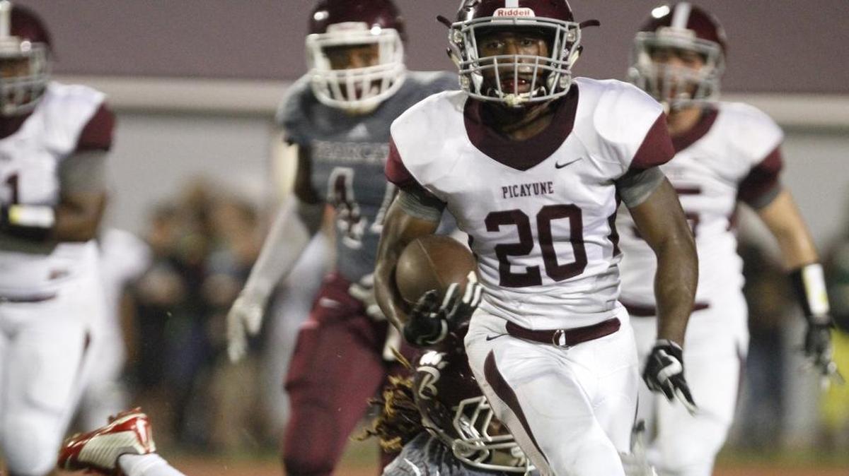 Picayune running back Shaun Anderson outruns Long Beach safety Gerald Jones, Jr. during the first quarter of their game at Lumpkin-Magee Stadium in Long Beach on Friday, Oct. 13, 2017.