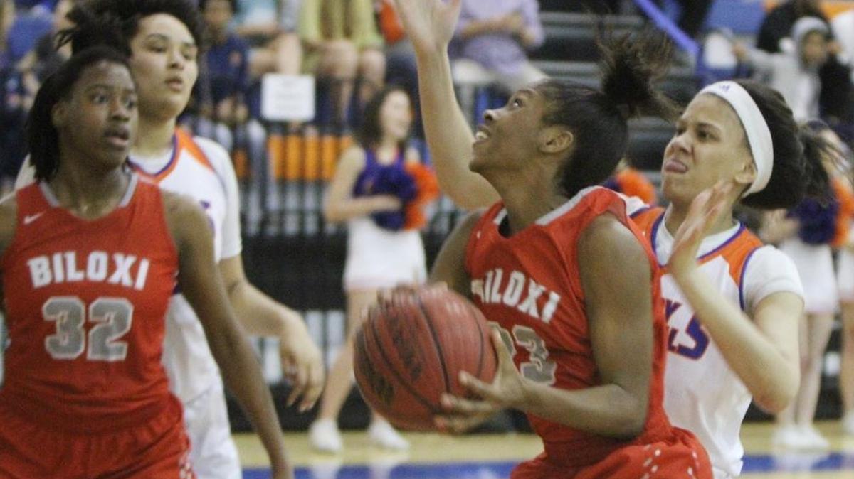 Biloxi's Shylia McGee drives to the basket past Gulfport's Alexus Marsh during the first quarter of their game at Bert Jenkins gym in Gulfport on Friday, Jan. 20, 2017. McGee helped lead BHS past Long Beach on Tuesday night.