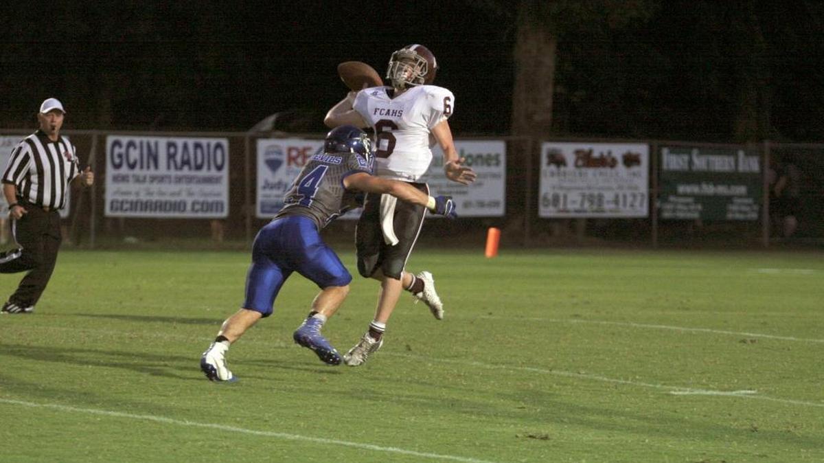 Kaleb Chauppetta hits the quarterback right before he let go of another pass.