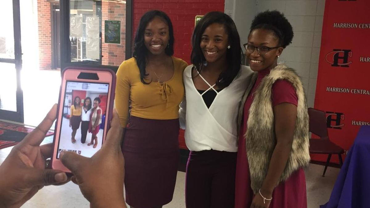 Harrison Central’s Ashley Arnold, Amari Ramsey and Desirea Lindsey pose for a photo prior to signing to play softball at Alcorn State University on Monday.