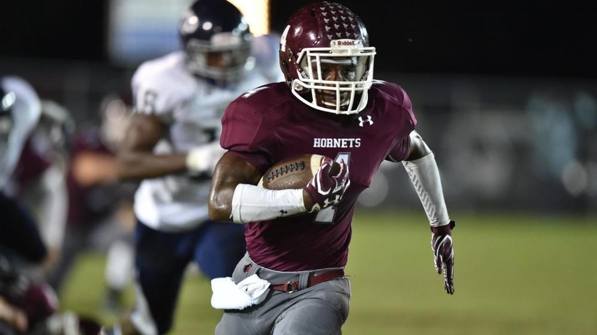 East Central running back Tony Brown (4) runs for a long touchdown against Moss Point in the second quarter, Friday, Sept. 29, 2017, at East Central High School in Hurley. Brown was named to USA Today’s All-Mississippi team on Wednesday.