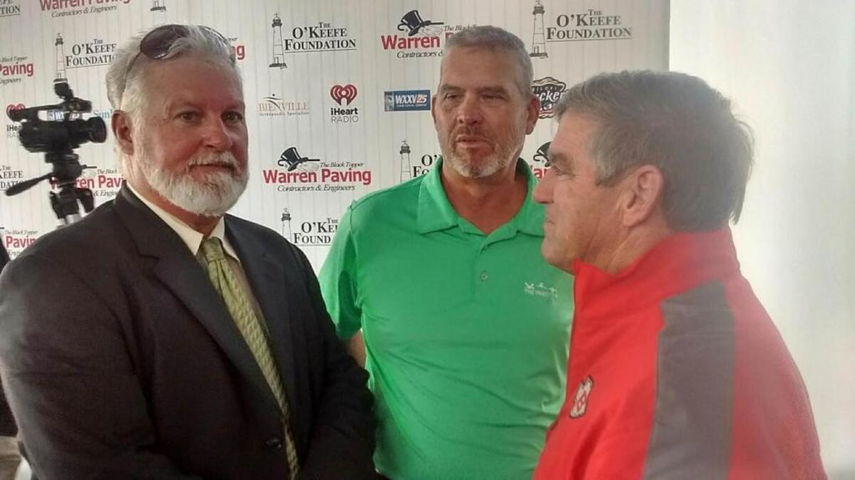 Stan Cliburn (left) speaks with Biloxi athletic director Tom Gladney as former Ocean Springs baseball coach Steve Tomaszewski (center) looks on. Cliburn, who has won over 1,600 games as a Minor League manager, spoke Friday at the Ohr-O'Keefe Museum of Art Our Love Affair with Baseball Friday Luncheon.