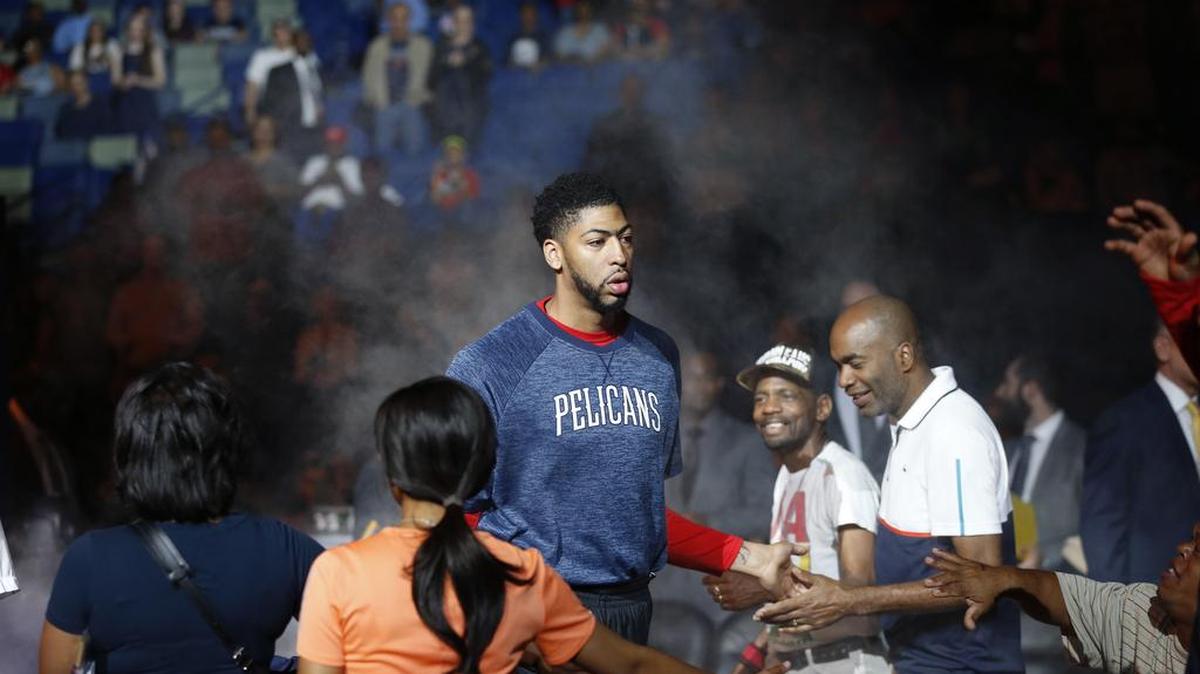 New Orleans Pelicans forward Anthony Davis walks onto the court.