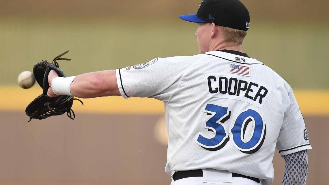 Biloxi Shuckers first baseman Garrett Cooper catches a throw for a put out for the South Division All-Stars on Tuesday, June 21, 2016, in the Southern League All-Star Game at Trustmark Park in Pearl, Miss.