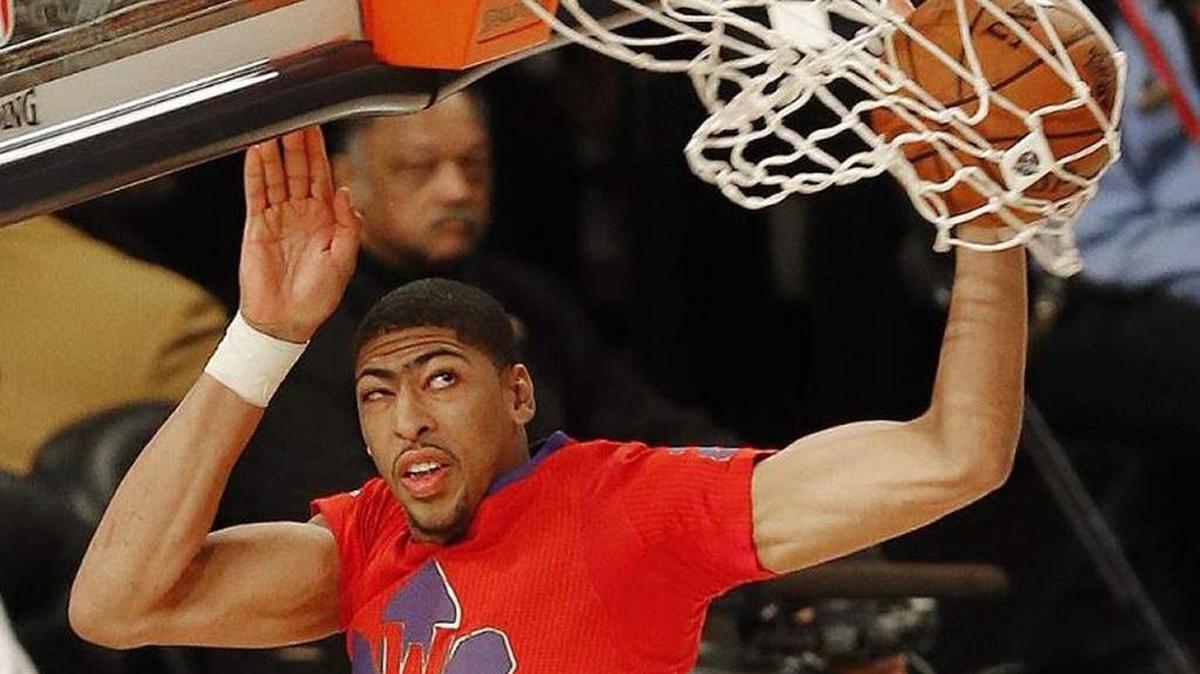 Anthony Davis of the New orleans Pelicans dunks the ball against the East Team during the NBA All-Star Game at the Smoothie King Center in 2014.