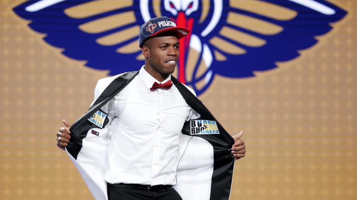 New Orleans Pelicans first-round draft pick Buddy Hield shows off his clothing during the NBA Draft on Thursday, June 23, 2016, from Barclays Center in Brooklyn, N.Y.