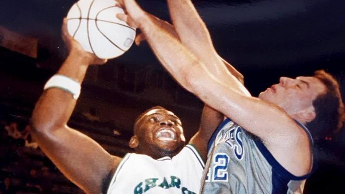 Tracy Pearson of the Mississippi Coast Sharks goes for the basket against Dan Cyrulik of the South Georgia Blues at the Mississippi Coast Coliseum in 1992. The Sharks will part of the Global Basketball Association and played games in Biloxi.