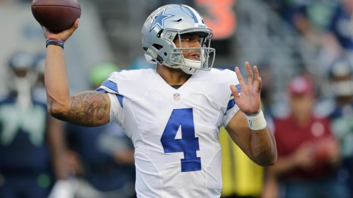 FILE - This Aug. 25, 2016 file photo shows Dallas Cowboys quarterback Dak Prescott grew up rooting for the Dallas Cowboys in Louisiana and suddenly finds himself in line to start their opener as a rookie quarterback with Tony Romo sidelined by yet another back injury.