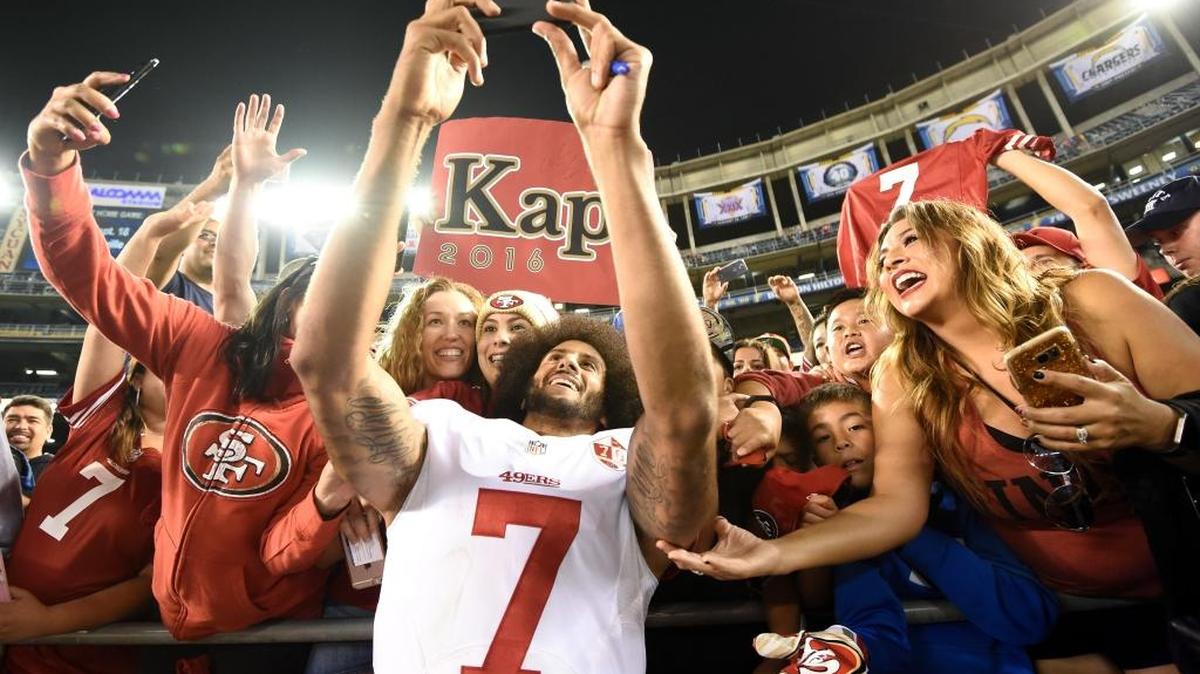 San Francisco 49ers quarterback Colin Kaepernick greets fans after their 31-21 preseason win against the Chargers on Thursday night in San Diego.